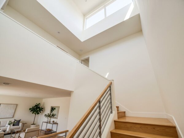 Tall stairwell with drywall taped and finished flawlessly from bottom to top