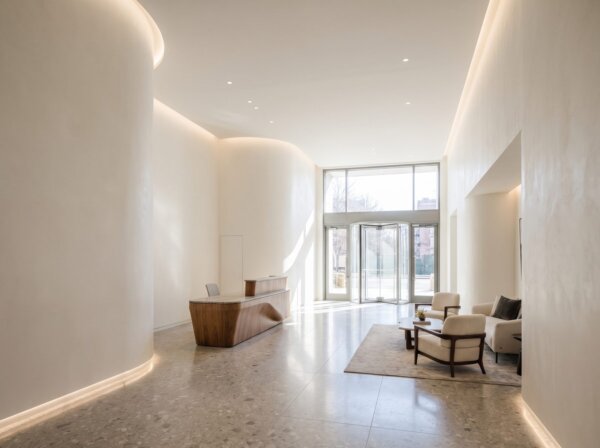 Striking finished building lobby with flawless drywall walls over steel framing